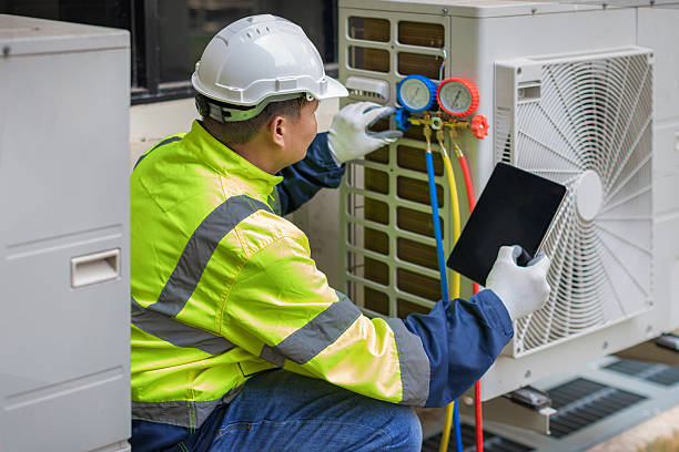 Professional Heat Pump Repair technician working in Derby, CO